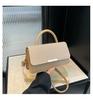 2025 Moda Casual Um Ombro Crossbody Casual Estilo Ocidental Trendy Cor Sólida Textura Bolsa Feminina Emendado Pequeno Quadrado Novo Estilo