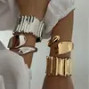 Pulseira Europeia e Americana Transfronteiriça Moda Multifacetada Curva Lisa Dourada Aberta Ajustável Desalinhada Irregular