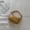 Bolso de axila para mujer de nicho, nuevo bolso de hombro vintage otoño 2026, versátil para el uso diario, bolso de hombro cruzado