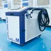 Máquina de soldadura láser de doble brazo de 3000 vatios para moldes de chapa metálica, tubos cuadrados y puertas y ventanas, fabricante de máquina de soldadura láser de mano