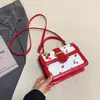 Nova bolsa transversal fofa com estampa de cereja, bolsa com alça torcida, design fresco color-blocking, bolsa de ombro simples para mulheres
