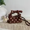 Bolso de mano de lunares de nicho estilo coreano transfronterizo para mujer, nuevo 2026 súper popular, bolso versátil de moda para hombro y cruzado