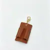 Llavero con Correa y Clip para Bolígrafo de Cuero PU con Patrón de Lichi, Estuche de Cuero Portátil Anti-Pérdida para Bolígrafo, Portalápices Elegante y Sencillo