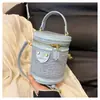 Bolsos de Mujer de Gama Alta de Nicho Transfronterizos, Bolso Cruzado de Moda Nuevo Verano 2026, Bolso de Cubo Popular Estilo Coreano