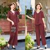 Moda para madre de mediana edad estilo extranjero camiseta top traje 2025 señora estilo nacional vintage pantalones conjunto de dos piezas