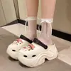 Calzado Exterior Grueso de Dibujos Animados con Suela Gruesa Zapatos Cueva Tacón Súper Alto para Mujer 9.5CM Vestido de Verano Chanclas Baotou de Playa