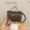 Bolsa quadrada pequena estilo INS coreano bolsa de ombro única feminina bolsa de mão de bolinhas estilosa popular deste ano bolsa tote pequena transfronteiriça
