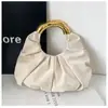 2026 Nova Moda Feminina Bolsa Concha Bolsa de Mão Transversal de Ombro Bolsa Feminina Simples Nuvem Plissada Bolsa Feminina de Comércio Exterior