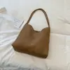 Nova bolsa de balde texturizada tecida estilo retrô coreano 2026, simples e minimalista, cor sólida, adequada para o dia a dia, pode ser carregada como bolsa de ombro ou bolsa de axila