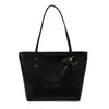 Bolsos Transfronterizos para Mujer 2025 Otoño Nuevo Versátil Color Sólido Letra Gran Capacidad Moda Viajero Bolso de Hombro Bolso Tote