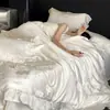 Nuevo juego de ropa de cama de cuatro piezas jacquard de algodón Tencel estilo francés, con sábanas de seda helada, una funda de edredón y ropa de cama con volantes para un sueño confortable