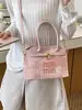 Bolsas de Alta Gama para Mujer 2026 Primavera Bolsos de Nuevo Estilo Versátil Elegante Textura de Nicho Letra Bordada Bolso de Hombro de Mano