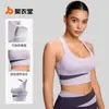 Top de tirantes de yoga para mujer en color melocotón, con diseño de retazos y copas extraíbles, con un hermoso diseño en la espalda, adecuado para fitness y deportes, y que ofrece absorción de impactos
