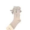 Novas meias de cano médio vazadas com strass e laço doce, meias da moda feminina, meias largas de celebridade da internet mais vendidas para primavera-verão