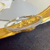 Pulsera retorcida de diseño exquisito francés con microincrustaciones de circonita, pulsera elegante de lujo ligero de alta gama, pulsera de moda versátil