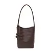 Bolso de Axila Vintage de Alta Gama para Mujer 2026 Nuevo Bolso Cubo con Patrón Tejido Bolso de Hombro Simple y Moderno