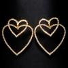 Pendientes de doble amor populares de AliExpress, pendientes de diamantes de imitación de estilo callejero de moda europea y americana, accesorios transfronterizos para mujer.