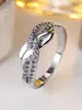 Anillo Cruzado Más Vendido de Diamante Morado Entrelazado Retorcido Simple de Lujo Ligero Anillo de Zirconia Morada Blanca Densa Entrelazada