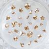 Venta caliente transfronteriza taladro de uñas de forma especial K9 con fondo de punta de champán transparente como el hielo Corazón Torcido ciruela cristal Super Destello empujador de uñas Diamante