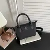 Bolso de teléfono de moda para mujer, nueva colección 2026, bolso de hombro de gran capacidad, elegante bolso tote, bolso de mano casual versátil