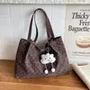 Bolso de mano retro, artístico y de diseño nicho, con un estilo preppy, un bolso de hombro nuevo y moderno, minimalista y de gran capacidad para mujer