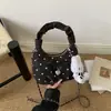 Nova bolsa balde retrô minimalista, bolsa casual fashion, bolsa de ombro e transversal feminina texturizada nova do outono de 2026