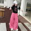 Conjunto de Pantalones Rosas de Pierna Ancha y Camiseta Negra Estampada a la Moda para Niñas Mayores 2026