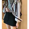 Falda Corta Deportiva Gris para Mujer Verano Estilo Caliente 2025 Nueva Cintura Alta Ajustada Versátil Simple Casual Falda Corta