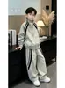 Conjunto de Otoño para Niños 2026 Estilo Nuevo: Elegante Conjunto Deportivo de Cortavientos y Pantalones de Dos Piezas para Niños, Atuendo Casual Infantil