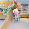 Llavero de Skateboard Sanrio de Dibujos Animados Melody Colgante de Bolsa Creativo Perro de Orejas Grandes Llavero para Llaves de Coche Pequeño Regalo