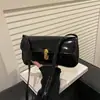 Bolsa de Ombro Pequena Quadrada Estilo Francês Tendência 2026 Novo Modelo Fivela de Fechamento Moda Retrô Elegante para Axila Bolsa de Mão Única para Mulheres