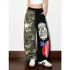 Pantalones anchos de camuflaje con bloques de color versátiles de estilo urbano para mujer, nuevo modelo verano 2026, pantalones jogger estampados con cordón para parejas, modernos