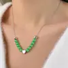 Collar de perlas estilo ins para mujer, diseño de nicho que combina con todo, cadena de clavícula con perlas de imitación de amor, colgante de amor, joyería al por mayor