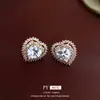 Pendientes de Corazón de Circonita de Aguja de Plata Europeos y Americanos Lujo Ligero Nicho Gama Alta Exquisitos Pendientes de Botón Moda Versátil Pendientes al por Mayor para Mujer