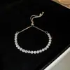 Pulsera Geométrica de Amor con Circonita Bañada en Oro Real Nicho Dulce Pulsera Versátil Joyería Elegante de Lujo Ligero de Gama Alta para Mujeres