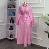 Moda Europeia e Americana Transfronteiriça Feminina Verão 2026 Nova Moda Conjunto de Camisa de Manga Longa Listrada Slim-Fit com Saia de Cintura Alta