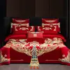 Juego de cuatro piezas para boda, todo algodón, festivo, diseño de dragón y fénix, ropa de cama de algodón puro para bodas, recién casados y parejas recién casadas, con una funda de edredón rojo brillante