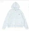 Primavera 2026 Nuevo Estilo Rayas Bloques de Color Casual Estilo Perezoso Cárdigan con Capucha Chaqueta Adelgazante Ropa Sencilla para Mujer