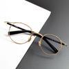 Armazón de gafas redondo de titanio puro del mismo estilo del Presidente Tan, calidad Shenzhen 2526L gafas artísticas retro para hombres