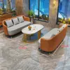 Juego de sofá de un asiento y mesa de centro para recepción de hotel, sala de reuniones de clientes, oficina de ventas, salón de belleza, centro comercial, mueble de sala de exposición, gama alta
