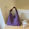 Bolso de hombro tipo tote de lona de color sólido minimalista estilo japonés, nueva moda 2026 de gran capacidad casual de alta apariencia