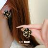 Pendientes de flor negra Aguja de Plata retro francés alto sentido nicho versátil temperamento pendientes Yiwu joyería al por mayor