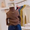 Ropa suave y cerosa para niños y niñas 2025 Otoño e Invierno Nuevo Cuello alto Versátil Rayas de punto Color puro Ropa de punto Camiseta básica