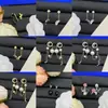 Pendientes de Marca de Lujo Europea y Americana Transfronterizos Nueva Versión de Gama Alta con Letras del Logo, Pendientes de Rombo con Forma de Trébol de Cuatro Hojas para Mujer Venta al por Mayor