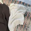 Elegante y sofisticado suéter de punto trenzado para mujer, 100% lana de oveja, cuello polo, elegante top de manga corta, disponible en cinco colores, 2026