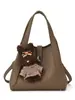 Bolso Cubo Sencillo de Mano Estilo Coreano para Mujer 2026 Nuevo Modelo Invierno Bolso de Hombro Cruzado Minimalista Elegante de Alta Calidad