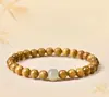 Pulsera de Hilo Único de Nanmu de Seda Dorada Estilo Montaña Putuo para Hombres y Mujeres Cuentas de la Suerte Cuentas Budistas Pulsera de Cuentas de Oración Regalo