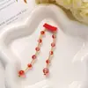 Ambiente festivo de vacaciones año nuevo borla roja cuentas de arroz pegatinas de tela flor para zapatos accesorios para el cabello clip de borde parche para zapatos bolsa ropa