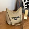Nova Bolsa Transversal Estilosa 2025 Bolsa de Ombro de Lona Fashion Versátil para Mulheres Sensação de Alto Padrão Grande Capacidade Bolsa com Letras