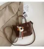 Bolso de mano de comercio exterior moderno y a la moda para mujer, nuevo y elegante bolso tipo cubo retro, bolso de hombro y cruzado de alto valor para el día a día